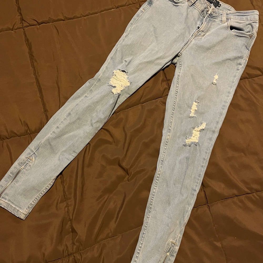 Women's Light Blue Distressed Jeans